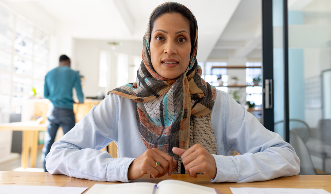 woman sitting at a desk