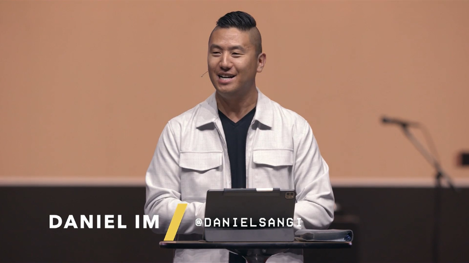 Daniel Im speaking on stage