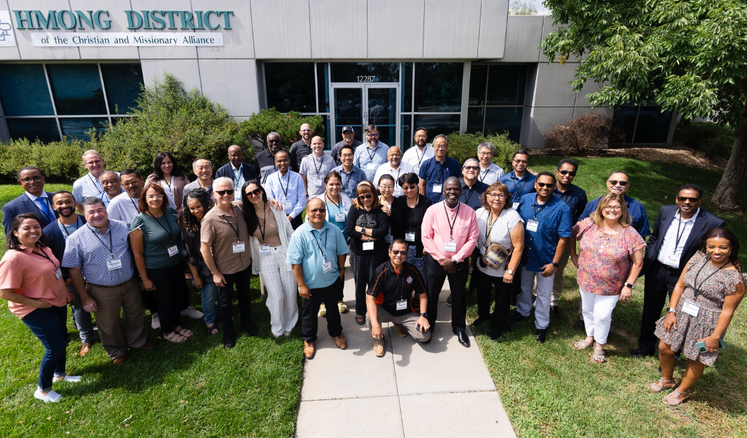 group photo of the Hmong District and National Office Multicultural Ministries staff