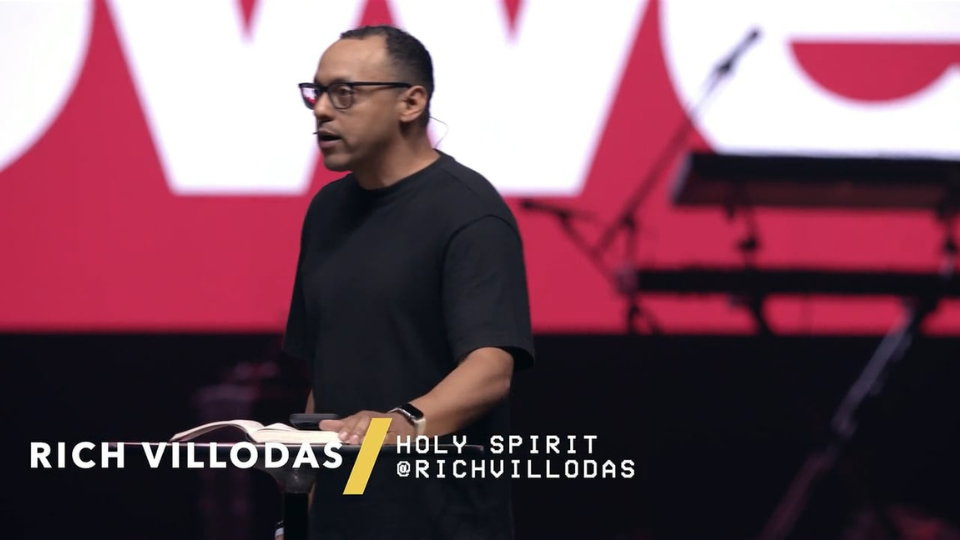 Rich Villodas speaking on stage