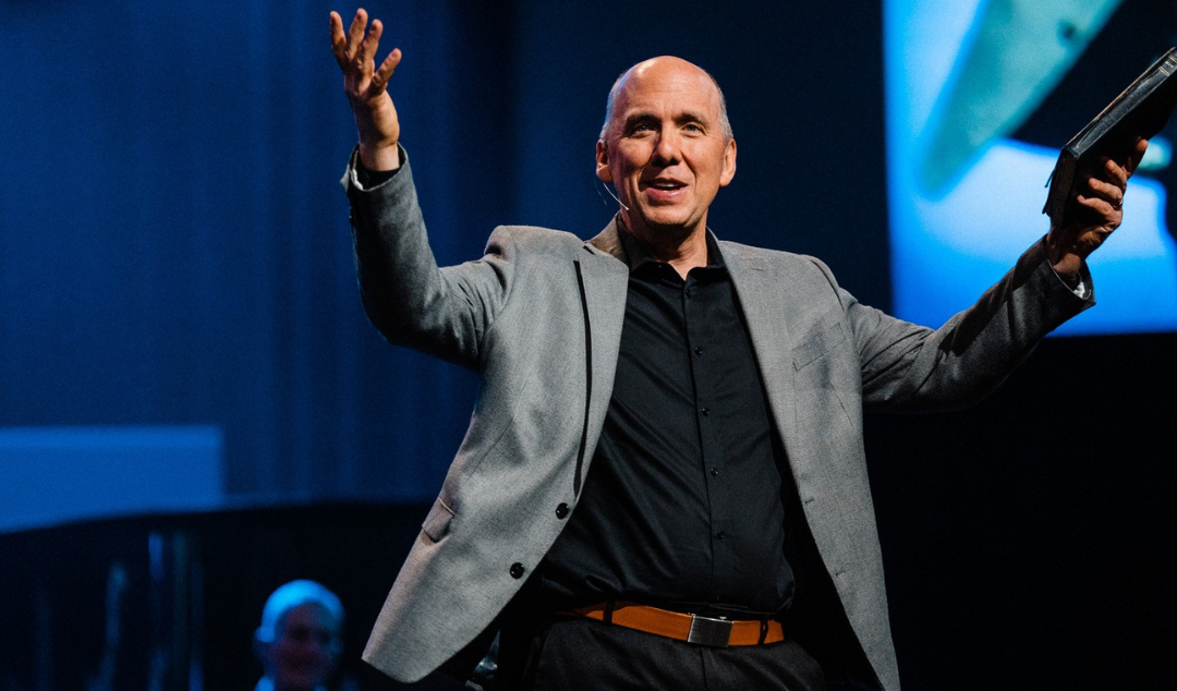Jonathan Schaeffer preaching on stage