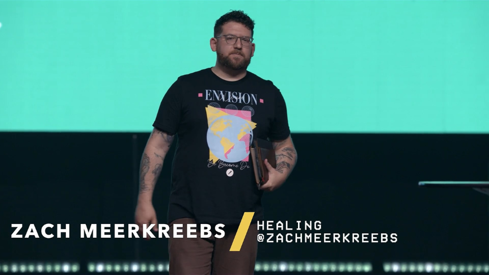 Zach Meerkreebs speaking on stage